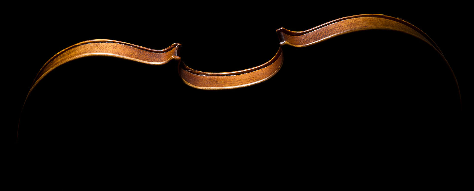 footer image of violin on its side